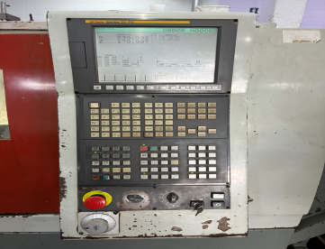 Foto: CENTRO DE TORNEAMENTO- ERGOMAT - TND180 - COMANDO FANUC - COM TRANSPORTADOR DE CAVACO - ANO 2009