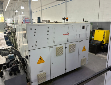 Foto: CENTRO DE TORNEAMENTO- ERGOMAT - TND180 - COMANDO FANUC - COM TRANSPORTADOR DE CAVACO - ANO 2009