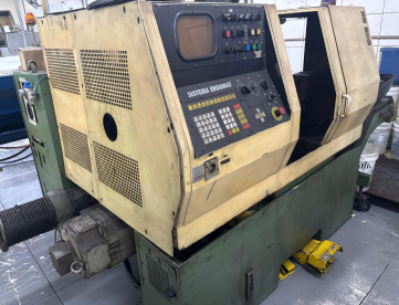 Foto: CENTRO DE TORNEAMENTO - TRAUB -TND-160 - MÁQUINA TRABALHANDO - ANO 1992