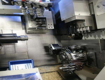 Foto: TORNO CNC AUTOMÁTICO DE CABEÇOTE MÓVEL - HANWHA - STL32H/J 12 EIXOS - COM ALIMENTADOR DE BARRAS - ANO 2013